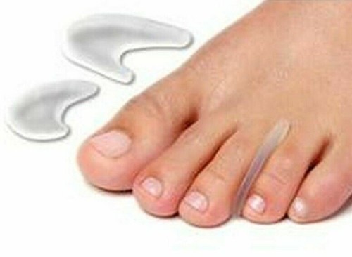 Gel toe separator - /,
